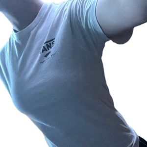 Vans white L T-shirt w/ black and white checkered and poppy flower graphic